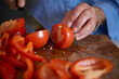 Woman Cutting Tomato