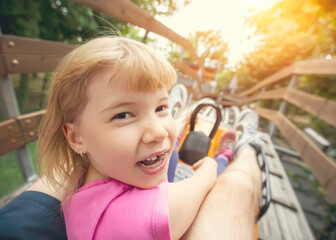 Poster - Summer toboggan-run from inside with cute smiling child