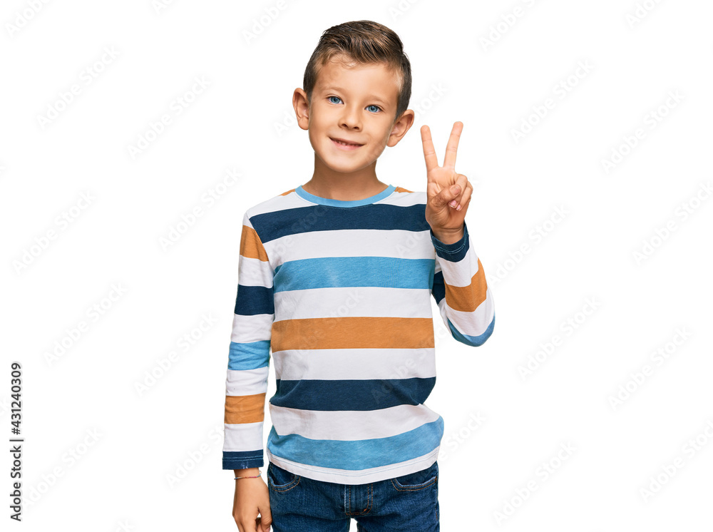 Adorable caucasian kid wearing casual clothes smiling with happy face winking at the camera doing victory sign. number two.