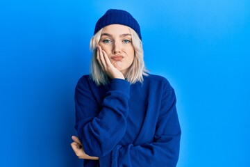 Poster - Young blonde girl wearing casual clothes thinking looking tired and bored with depression problems with crossed arms.