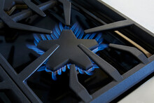 Close Up Of A Stove Top That Is Black