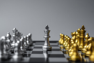 Wall Mural - silver and gold Chess figure on Chessboard against opponent during battle. Strategy, Success, management, business planning, think, education and leader concept