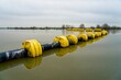 Heteren The Netherlands - 5 February 2021 -   Yellow floaters on Rhine near Heteren