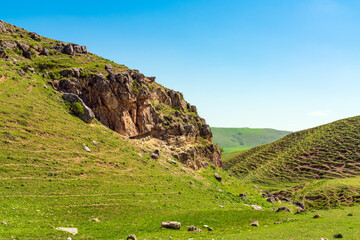 Wall Mural - Green hills and cliffs in spring