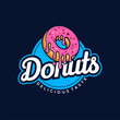 Donuts Logo Vector illustration. Design element for restaurant menu illustration or for logotype.
