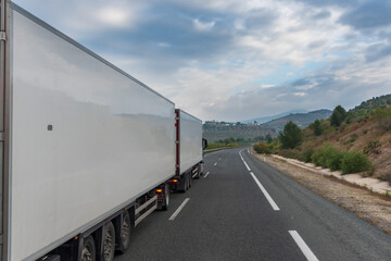 Canvas Print - Mega truck or duo trailer, a set of a truck with two semi-trailers.