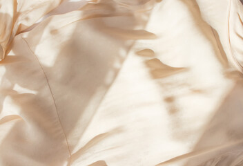 abstract beige background flat layout. modern minimalistic background with crumpled fabric texture a