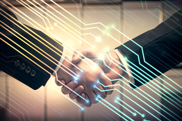 Double exposure of data theme hologram and handshake of two men. Partnership in IT industry concept.