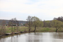 Abandoned Fishing Farm On The Nikozhel River, Visible Pond And Wooden Platforms For Fishermen Along The Banks, Moscow Region, April 2021