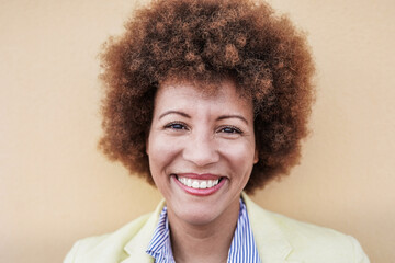 Portrait of mature african woman smiling in camera