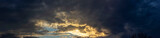 Fototapeta Na sufit - Panorama of cloudy sky with sun rays.