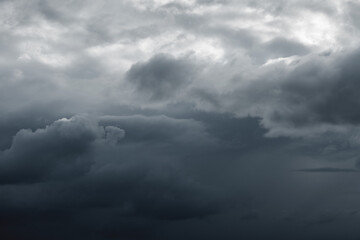 pre-storm sky with a black cloud
