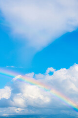 real maui, hawaiian rainbow, anuenue over the blue sky, heavenly sky, white cloud