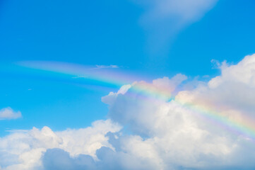 real maui, hawaiian rainbow, anuenue over the blue sky, heavenly sky, white cloud
