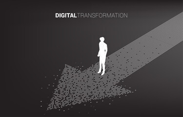 Silhouette of businessman standing on the arrow from pixel. concept of digital transformation of business.