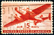 US Air Mail postage stamp depicting an illustration of a vintage transport plane