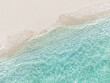 Aerial top view of beautiful tropical white sand beach with wave foam and transparent sea, Summer vacation and Travel background with copy space, Top view from drone