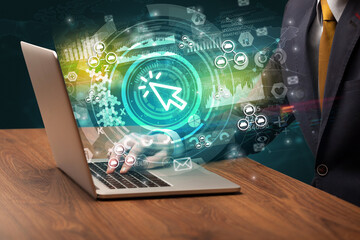 business hand typing on a modern laptop