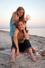 Wall Mural - happy girl resting on the shore