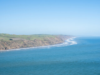 Wall Mural - South Head of Manukau harbour entrance from Whatipu beach, Auckland, New Zealand