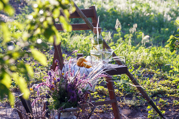 lemonade on a vintage wooden chair in the garden