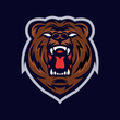 © iyas - Grizzly bear head mascot logo