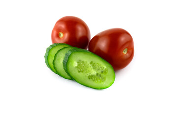 two red tomatoes and cucumber slices