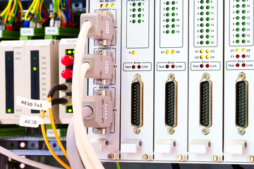 Poster - View of communication port module on PLC unit in control box of automation machine