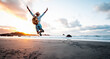 © Davide Angelini - Happy man with backpack jumping over the beach at sunset - Hiker enjoying freedom outdoor on sunshine - Success, travel and people concept