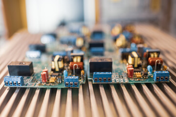 Microcircuits and components lie on metal plates