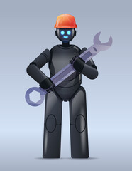 Poster - modern black robot in helmet holding wrench repair service artificial intelligence concept vertical