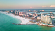 Panorama Of City Clearwater Beach FL. Summer Vacations In Florida. Beautiful View On Hotels And Resorts On Island. Blue Color Of Ocean Water. American Coast Or Shore Gulf Of Mexico. Sky After Sunset.