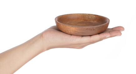 Wall Mural - Hand holding Wooden bowl isolated on a white background