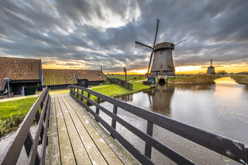 Poster - Bridge to Traditional wooden windmill