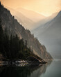 © SuperStock - The sun rise is enhanched by smoke from fires in interior Alaska as we sail into Tracy Arm.