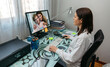 © David Pereiras - Woman talking on video call with her mother who is in hospital