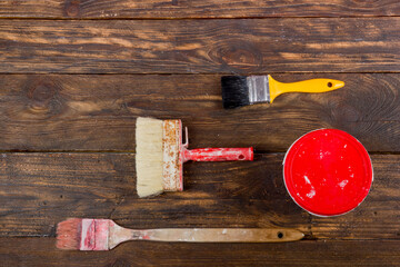 professional repairing implements for decorating and building renovation set on the wooden background. Plastering tools. Top view. Copy space for text.