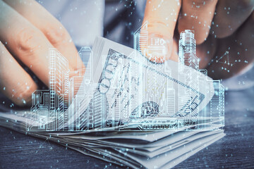 Poster - Multi exposure of buildings drawing hologram and USA dollars bills and man hands.