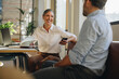 © Jacob Lund - Coworkers discussing new project