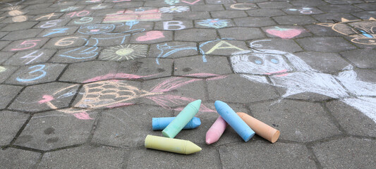 giant olorful chalk drawing on asphalt outdoors activity