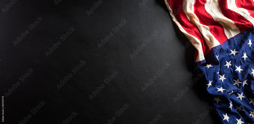 Happy memorial day concept made from american flag with text on black wooden background. - obrazy, fototapety, plakaty 