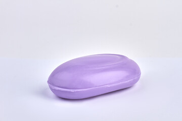 Wall Mural - Purple soap bar isolated on white background.