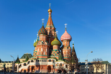 the colorful cathedral of st. basil the blessed with painted domes against the blue sky. summer sunn