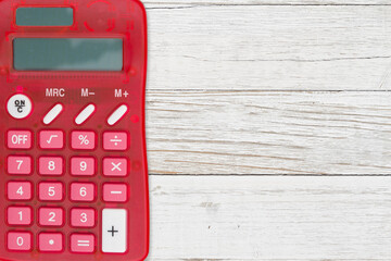 Sticker - Red calculator on weathered whitewash wood background