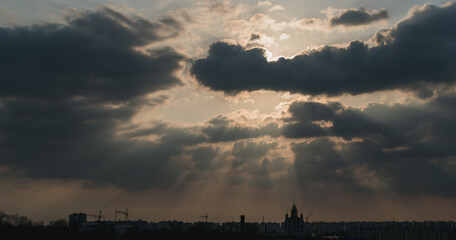 Wall Mural - Dark gloomy clouds during sunset