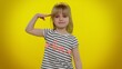 Yes sir. Subordinate, responsible serious teen child kid girl giving salute listening to order as if soldier, following discipline, obeying, expressing confidence. Yellow background. Young children