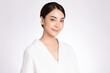 © kitthanes - Beautiful young Asian woman wearing bathrobe on white background, Face care, Facial treatment, Cosmetology, beauty and spa Concept.