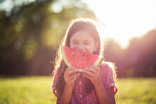  Fruit Day. Portrait Of Little Girl Holding Piece Of Watermelon.