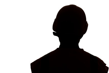 Wall Mural - dark silhouette of young engineer in hard hat on white isolated background, building industry concept