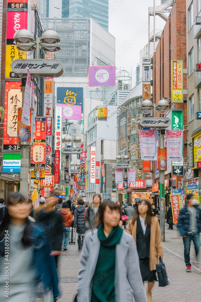 Tokyo, Japan - January 6, 2016: A busy shopping street in the Shinjuku district, Tokyo, Japan.